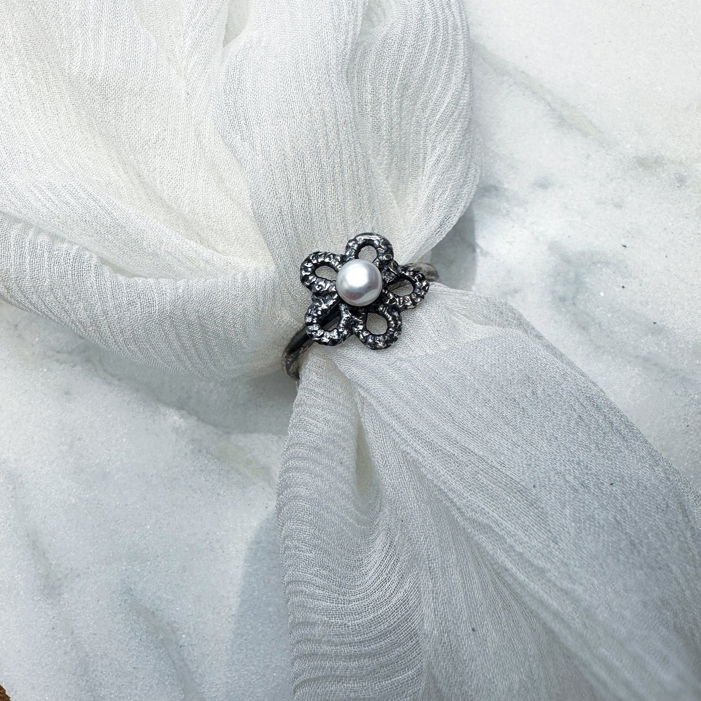 Cultured pearl forget-me-not ring in oxidised silver